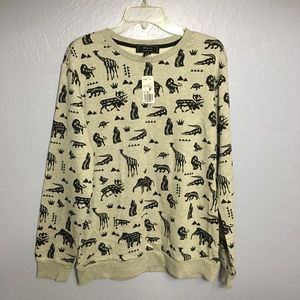 Men's crew neck. Grey with animal designs.